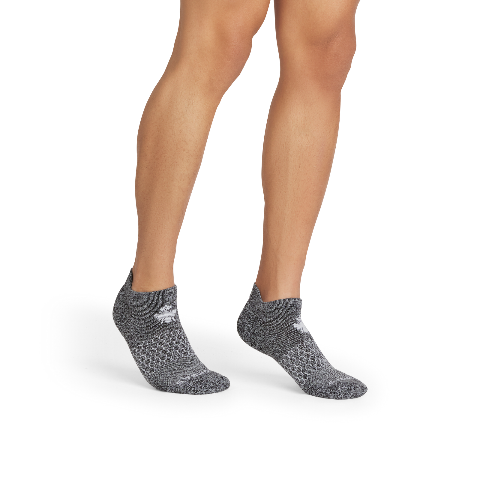 official-bombas::10339-black-white-adult-male-onmodel-2-transparent.png