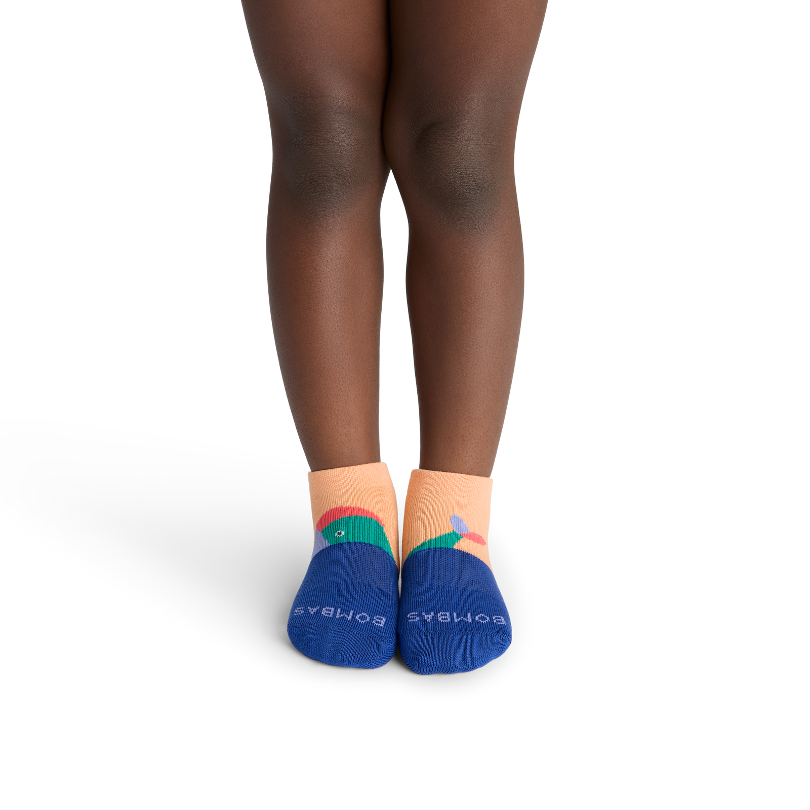 official-bombas::10414-apricot-junior-unisex-onmodel-2-transparent.png