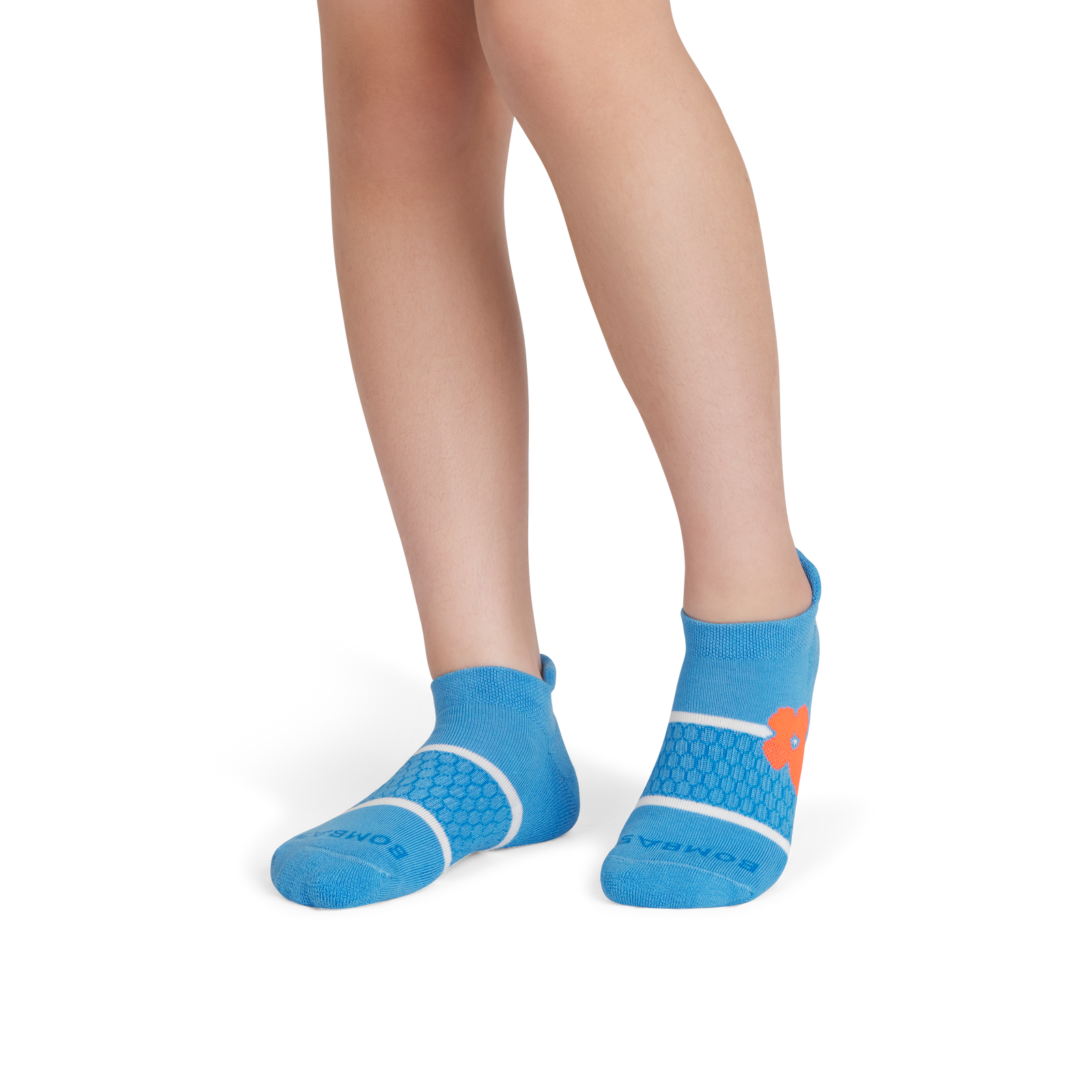 official-bombas::9133-tropicblue-youth-unisex-onmodel-2-transparent.png