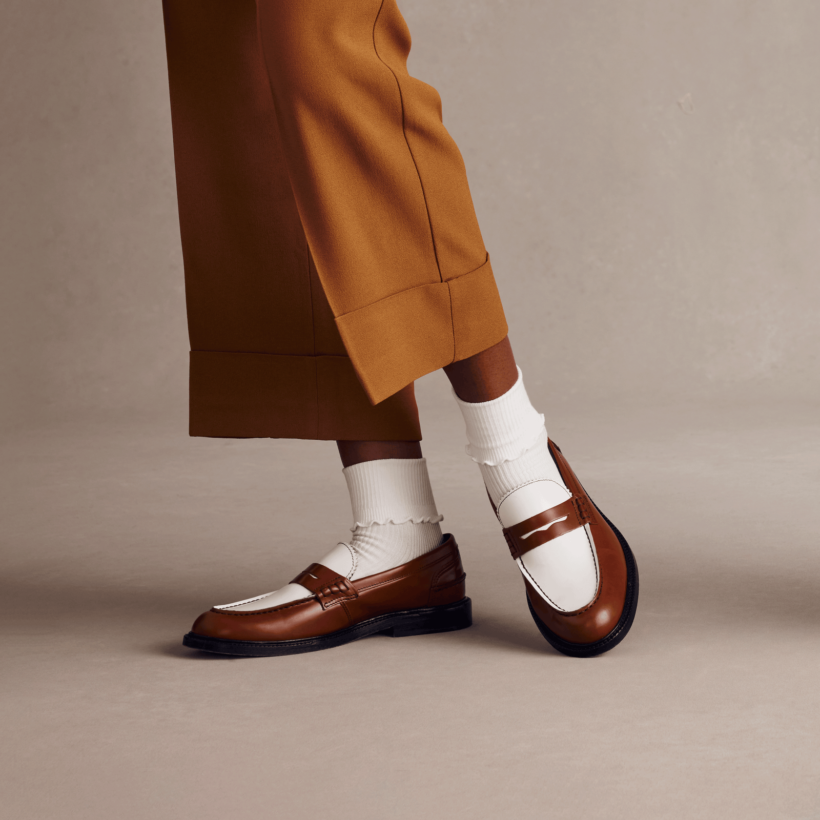 official-bombas::w-frilly-halfcalf-folded-lifestyle-transparent.png